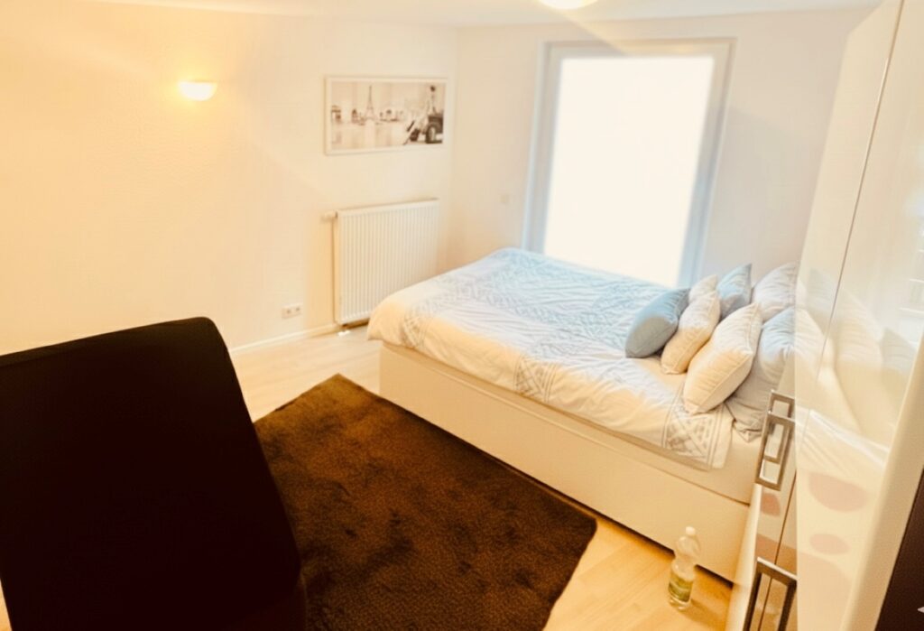 Cityresidenz Karlsruhe Schlafzimmer 1 mit Queensize Bett
