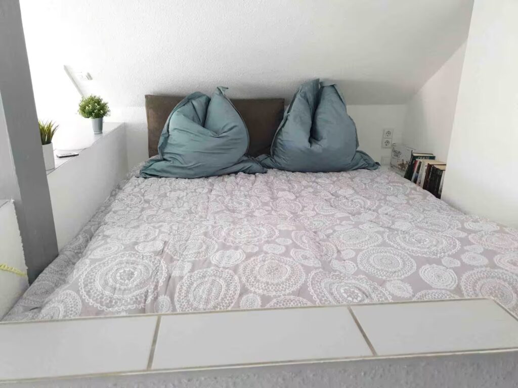 Loft Karlsdorf bequemes Bett im Schlafbereich