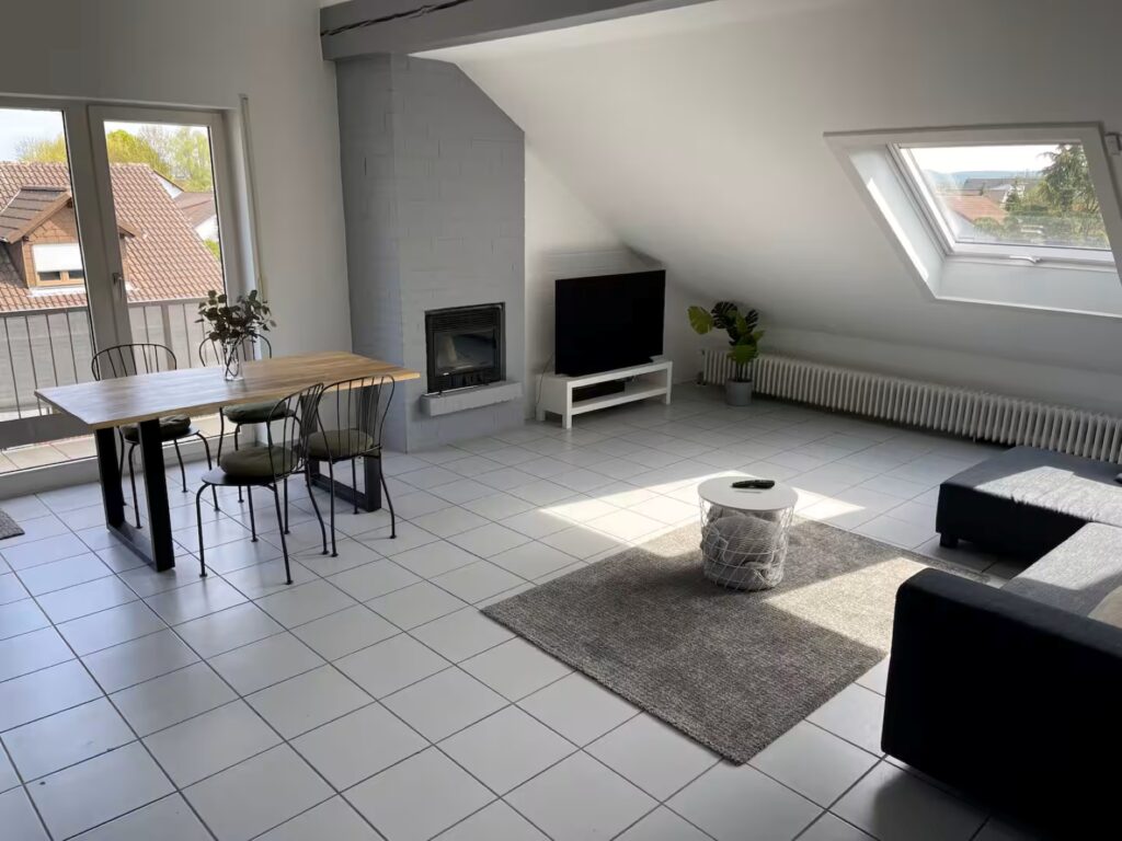 Loft Karlsdorf Wohnzimmer mit Kamin